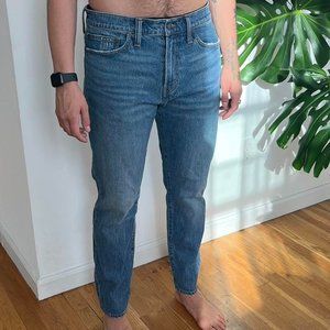 Madewell relaxed taper blue jeans.